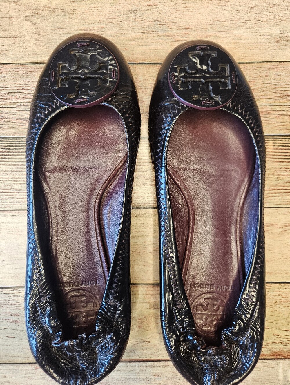 Tory Burch Reva patent leather ballet flats in burgandy.
